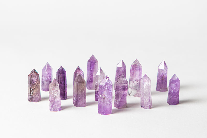 Amethyst purple authentic crystal points.  Buy different types of crystals online at Cryst Collective.