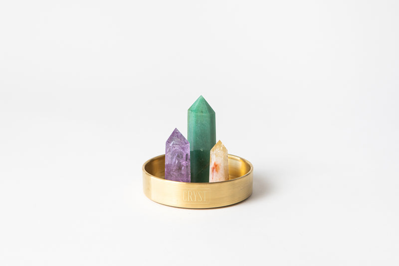 Aries zodiac star sign crystal set including amethyst, citrine and green aventurine crystals on a CRYST Collective brass base. Buy crystals online at Cryst Collective.