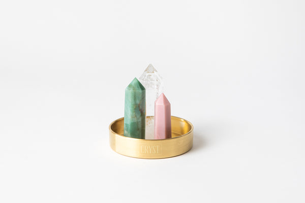 Calming and Healing Trio crystal set including clear quartz, green aventurine and pink opal crystals. These crystals work in synergy to calm the mind and heal the heart and reduces stress, on a CRYST Collective brass base.