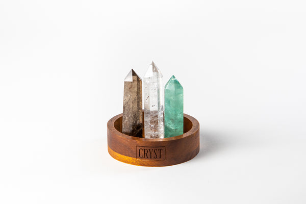 Capricorn zodiac star sign crystal set including Clear Quartz, Smoky Quartz and Green Fluorite crystals on a CRYST Collective wood base. Buy crystals online at Cryst Collective and feel the benefits of crystals.