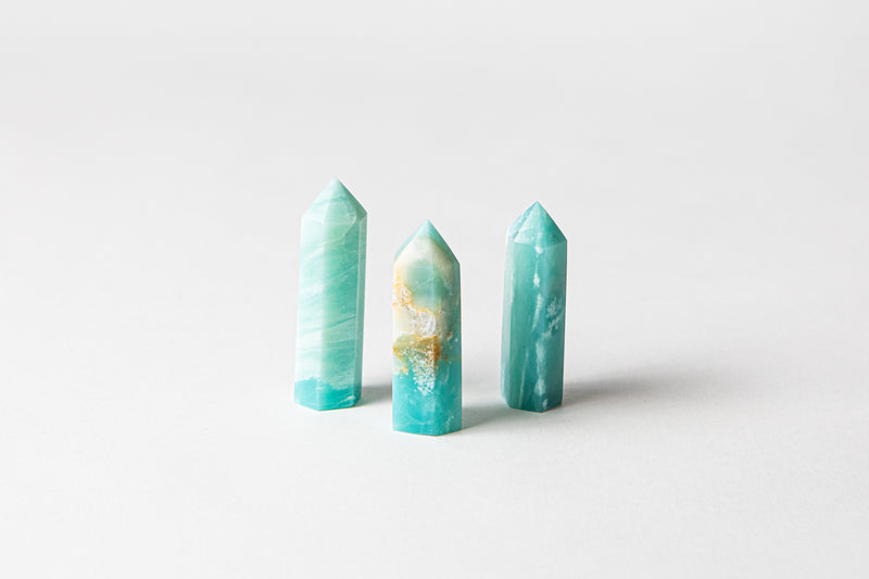 Caribbean Calcite authentic crystal points. Buy crystals online at Cryst Collective.