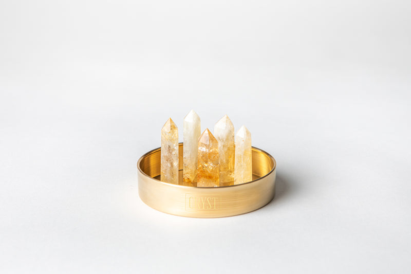 The Citrine Mini Cluster crystal set comes as a set of 5 authentic citrine crystal points on a CRYST Collective brass base. Citrine is an abundance stone, encouraging self-confidence, concentration and creativity. Buy crystals online at Cryst Collective and feel the benefits of having crystals in your space.