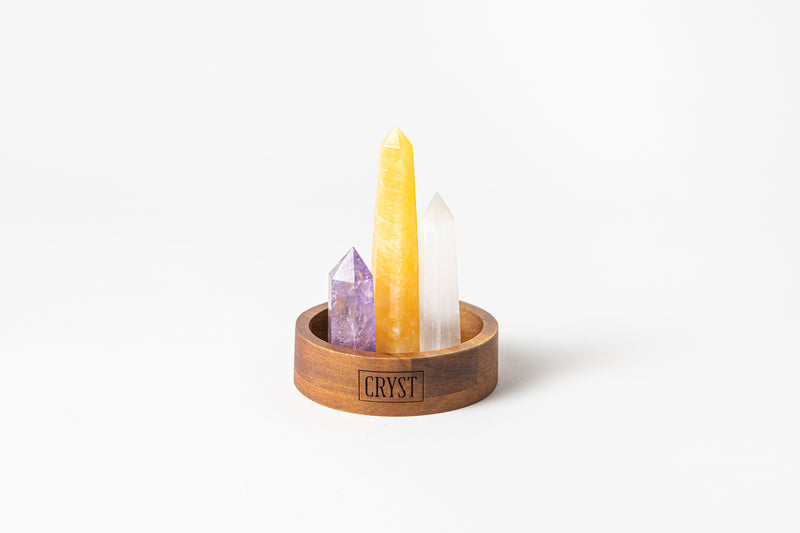Clearing Energy Trio crystal set including amethyst, selenite and orange calcite crystals on a CRYST Collective wood base. CRYST Collective interior decor pieces Australia.