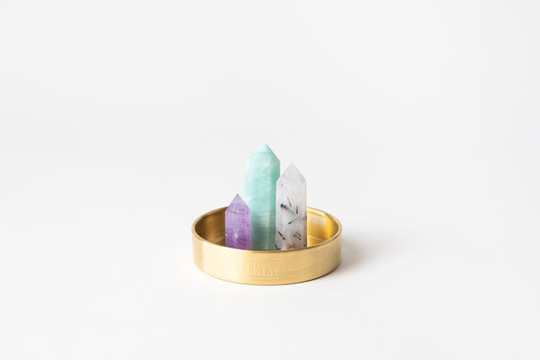 Gemini zodiac sign crystal set including Caribbean Calcite, Amethyst and Tourmaline Quartz authentic crystals, on a CRYST Collective brass base. Buy crystals online at Cryst Collective.