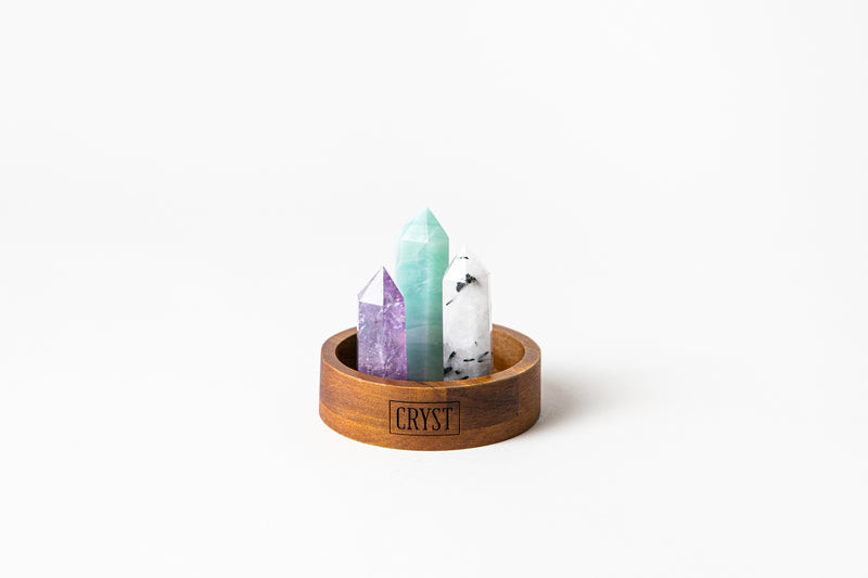 Gemini zodiac sign crystal set including Caribbean Calcite, Amethyst and Tourmaline Quartz authentic crystals, on a CRYST Collective wood base. Buy crystals online at Cryst Collective.