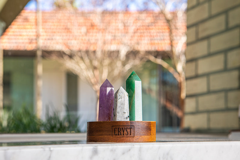 Libra zodiac star sign crystal set including amethyst, rainbow moonstone and green aventurine crystals on a CRYST Collective wood base.  Buy crystals online at Cryst Collective. Energy-charged crystals.