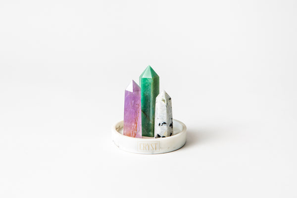 Libra zodiac star sign crystal set including amethyst, rainbow moonstone and green aventurine crystals on a CRYST Collective white marble base. Buy crystals online at Cryst Collective. Energy-charged crystals.