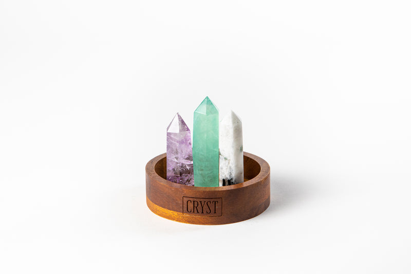 Pisces zodiac star sign crystal set including Rainbow Moonstone, Green Fluorite and Amethyst crystals on a CRYST Collective wood base. Buy crystals online at Cryst Collective and feel the benefits.