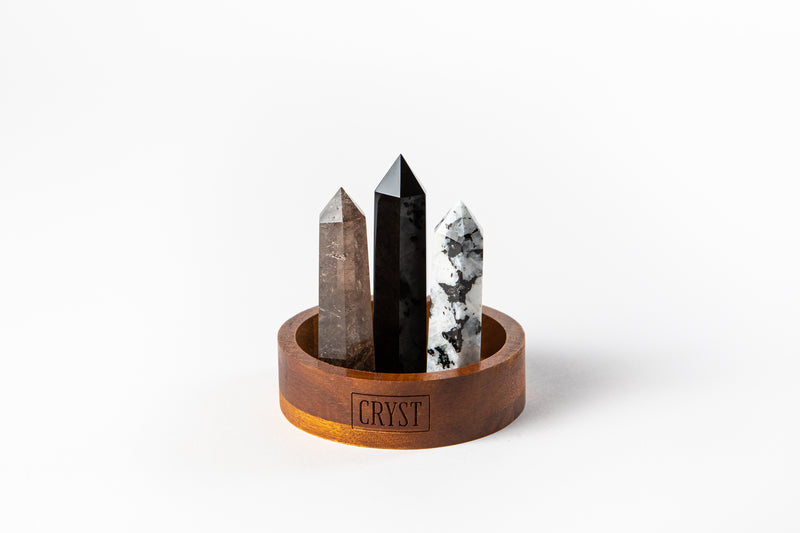 Scorpio zodiac star sign crystal set including Smoky Quartz, Onyx and Rainbow Moonstone crystals. These crystals work in synergy for the Scorpio star sign and comes on a CRYST Collective wood base. Buy crystals online at Cryst Collective.