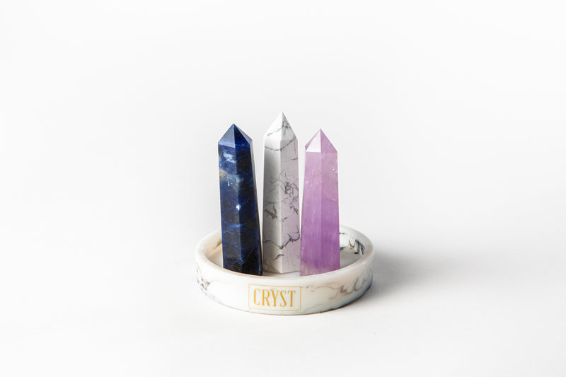 The Sleep Trio crystal set includes Smoky Quartz, White Howlite and Amethyst crystals. These crystals work in synergy to relax the body and mind to promote sleep and relaxation, comes on a CRYST Collective white marble base. CRYST Collective modern interior decor pieces Australia.