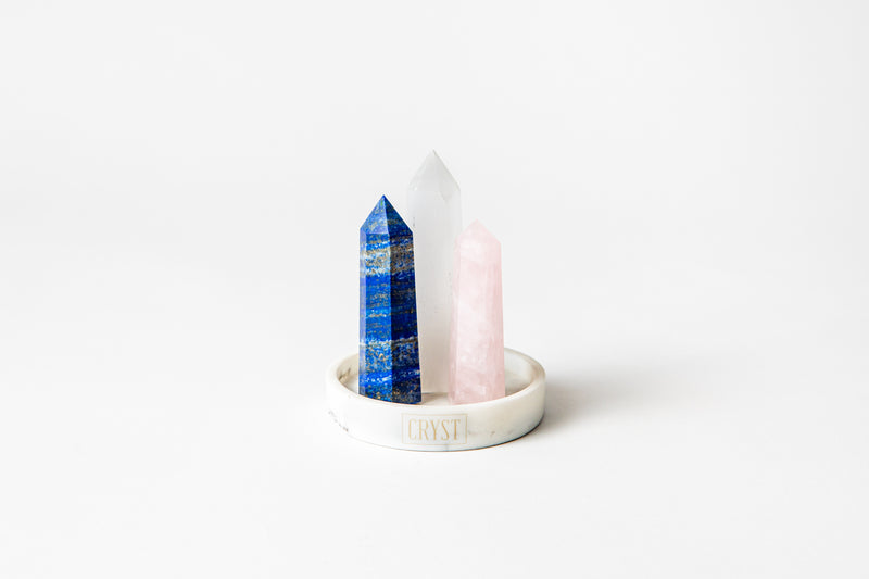 The Taurus Trio crystal set on a white base. Lapis Lazuli, Rose Quartz, Selenite open the heart, intuition and connection to spirit. Buy crystals online at Cryst Collective.