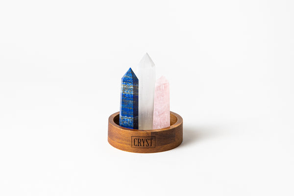 Taurus zodiac star sign crystal set includes rose quartz, lapis lazuli and selenite crystals, comes on a CRYST Collective wood base. Buy crystals online at Cryst Collective.