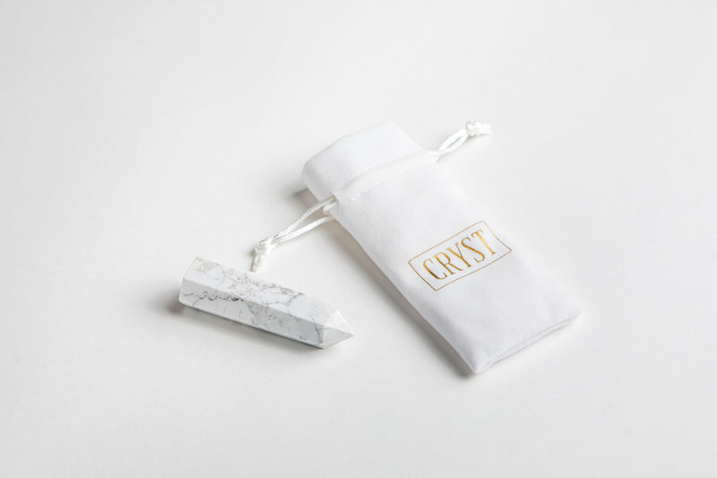White Howlite authentic crystal point, CRYST Collective authentic crystal interior decor pieces for healing and zodiac signs. Each set comes with a CRYST travel pouch.