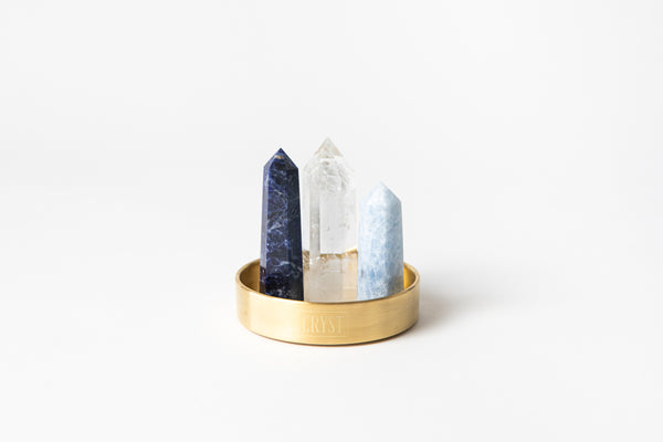 Your Authentic Truth trio crystal set includes Sodalite, Clear Quartz and Blue Calcite crystals. These crystals work in synergy to promote authenticity, individuality and self-expression, comes on a CRYST Collective brass base. CRYST Collective modern interior decor pieces Australia.
